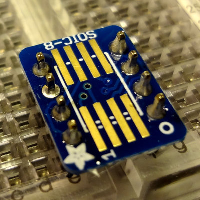 SOIC-8 breakout board soldered to header pins