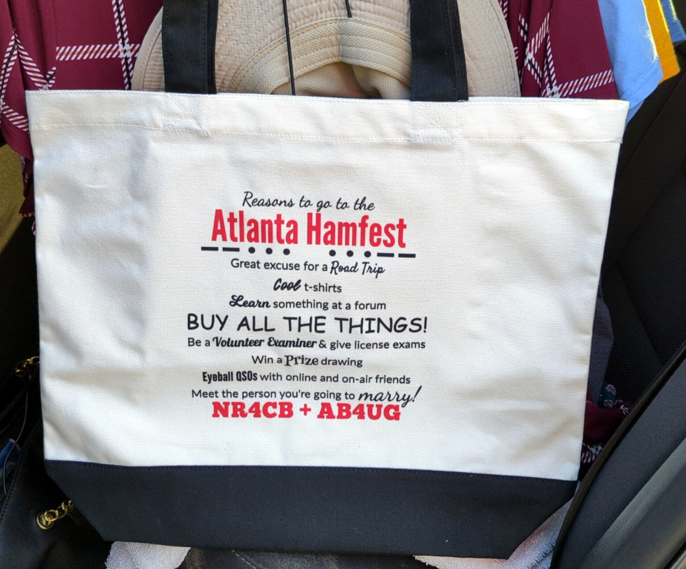 A tote bag with text to commemorate the 10th anniversary of NR4CB and AB4UG meeting