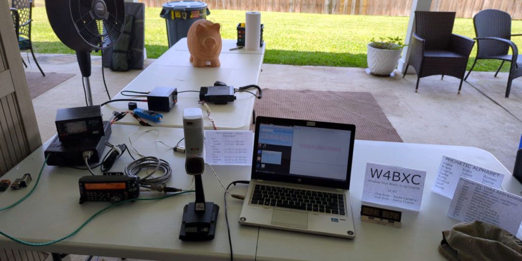 Radios and laptop set up for ARRL Field Day 2023